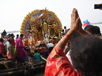 Maharaja Naba Krishna starts Durga Puja in 1757 at Sovabazar Royal Palace. An idol of Goddess Durga is seen being uploaded onto two boat mid...