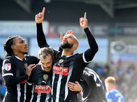 David McGoldrick of Notts County celebrates after scoring from the penalty spot to make it 2-2 during the Sky Bet League 2 match between Che...