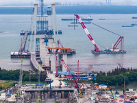 A photo taken on October 12, 2024, shows the construction site of the south main tower of the Zhangjinggao Yangtze River Bridge in Zhangjiag...