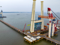 A photo taken on October 12, 2024, shows the construction site of the south main tower of the Zhangjinggao Yangtze River Bridge in Zhangjiag...