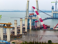 A photo taken on October 12, 2024, shows the construction site of the south main tower of the Zhangjinggao Yangtze River Bridge in Zhangjiag...