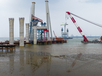 A photo taken on October 12, 2024, shows the construction site of the south main tower of the Zhangjinggao Yangtze River Bridge in Zhangjiag...