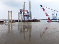 A photo taken on October 12, 2024, shows the construction site of the south main tower of the Zhangjinggao Yangtze River Bridge in Zhangjiag...