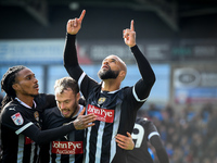 David McGoldrick of Notts County celebrates with teammates after scoring a goal to make it 2-2 during the Sky Bet League 2 match between Che...