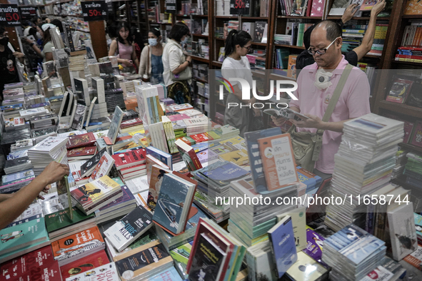 Visitors check books on display during the Book Expo Thailand 2024 in Bangkok, Thailand, on October 12, 2024. The Book Expo Thailand 2024 ta...