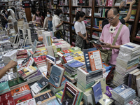 Visitors check books on display during the Book Expo Thailand 2024 in Bangkok, Thailand, on October 12, 2024. The Book Expo Thailand 2024 ta...