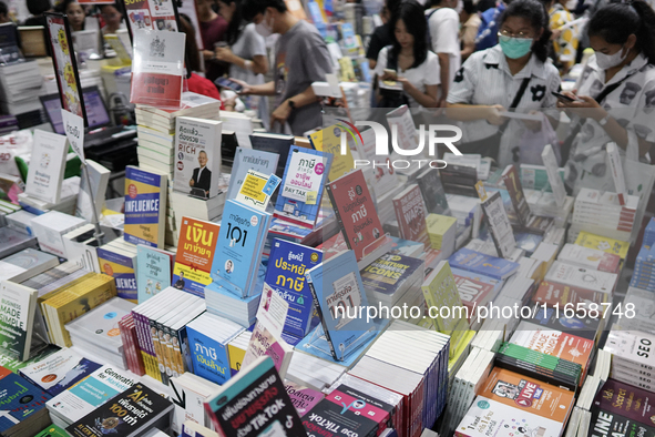 Visitors check books on display during the Book Expo Thailand 2024 in Bangkok, Thailand, on October 12, 2024. The Book Expo Thailand 2024 ta...