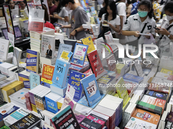 Visitors check books on display during the Book Expo Thailand 2024 in Bangkok, Thailand, on October 12, 2024. The Book Expo Thailand 2024 ta...