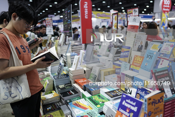 Visitors check books on display during the Book Expo Thailand 2024 in Bangkok, Thailand, on October 12, 2024. The Book Expo Thailand 2024 ta...