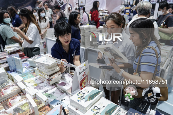 Visitors check books on display during the Book Expo Thailand 2024 in Bangkok, Thailand, on October 12, 2024. The Book Expo Thailand 2024 ta...