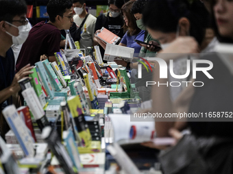 Visitors check books on display during the Book Expo Thailand 2024 in Bangkok, Thailand, on October 12, 2024. The Book Expo Thailand 2024 ta...