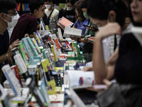 Visitors check books on display during the Book Expo Thailand 2024 in Bangkok, Thailand, on October 12, 2024. The Book Expo Thailand 2024 ta...