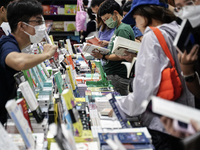 Visitors check books on display during the Book Expo Thailand 2024 in Bangkok, Thailand, on October 12, 2024. The Book Expo Thailand 2024 ta...