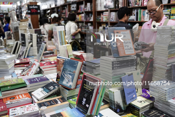 Visitors check books on display during the Book Expo Thailand 2024 in Bangkok, Thailand, on October 12, 2024. The Book Expo Thailand 2024 ta...