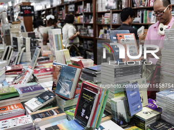 Visitors check books on display during the Book Expo Thailand 2024 in Bangkok, Thailand, on October 12, 2024. The Book Expo Thailand 2024 ta...