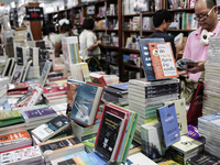 Visitors check books on display during the Book Expo Thailand 2024 in Bangkok, Thailand, on October 12, 2024. The Book Expo Thailand 2024 ta...