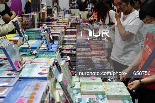 Visitors check books on display during the Book Expo Thailand 2024 in Bangkok, Thailand, on October 12, 2024. The Book Expo Thailand 2024 ta...