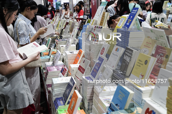 Visitors check books on display during the Book Expo Thailand 2024 in Bangkok, Thailand, on October 12, 2024. The Book Expo Thailand 2024 ta...