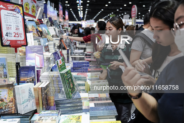 Visitors check books on display during the Book Expo Thailand 2024 in Bangkok, Thailand, on October 12, 2024. The Book Expo Thailand 2024 ta...