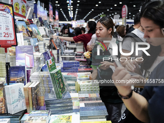 Visitors check books on display during the Book Expo Thailand 2024 in Bangkok, Thailand, on October 12, 2024. The Book Expo Thailand 2024 ta...