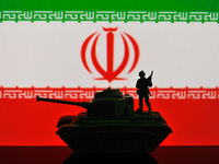 Illustration with figures of a soldier and a tank in front of an Iran flag displayed on a computer screen is seen in L'Aquila, Italy, on Oct...