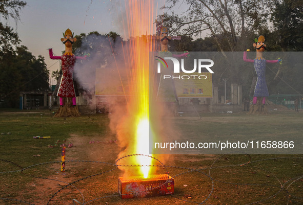 Firecrackers are burst on the occasion of the Hindu festival of Dussehra, which marks the triumph of good over evil, in Srinagar, Jammu and...