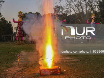 Firecrackers are burst on the occasion of the Hindu festival of Dussehra, which marks the triumph of good over evil, in Srinagar, Jammu and...