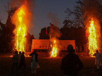 Effigies of the mythic demon king Ravana, his son Meghnath, and brother Kumbhkaran burn on the occasion of the Hindu festival of Dussehra, w...