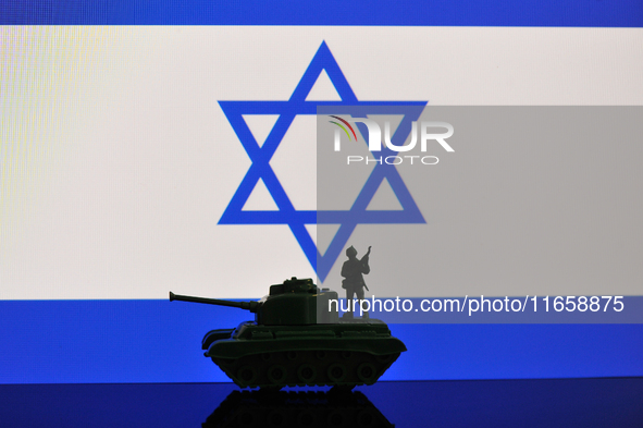 Illustration with figures of a soldier and a tank in front of an Israel flag displayed on a computer screen is seen in L'Aquila, Italy, on O...