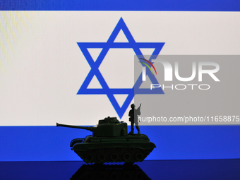 Illustration with figures of a soldier and a tank in front of an Israel flag displayed on a computer screen is seen in L'Aquila, Italy, on O...