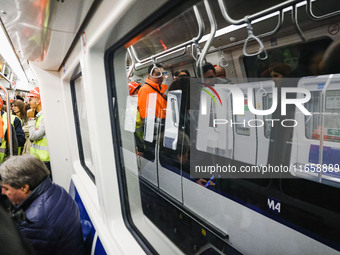 A moment occurs during the inauguration of the entire section of the Metropolitana M4 Blu Line from San Cristoforo to Linate in Milan, Italy...