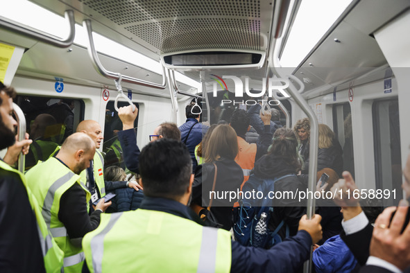 A moment occurs during the inauguration of the entire section of the Metropolitana M4 Blu Line from San Cristoforo to Linate in Milan, Italy...