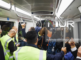 A moment occurs during the inauguration of the entire section of the Metropolitana M4 Blu Line from San Cristoforo to Linate in Milan, Italy...