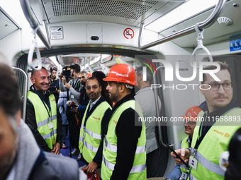 A moment occurs during the inauguration of the entire section of the Metropolitana M4 Blu Line from San Cristoforo to Linate in Milan, Italy...