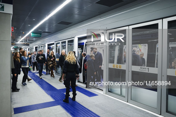 A moment occurs during the inauguration of the entire section of the Metropolitana M4 Blu Line from San Cristoforo to Linate in Milan, Italy...