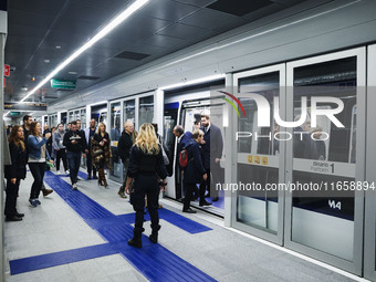 A moment occurs during the inauguration of the entire section of the Metropolitana M4 Blu Line from San Cristoforo to Linate in Milan, Italy...