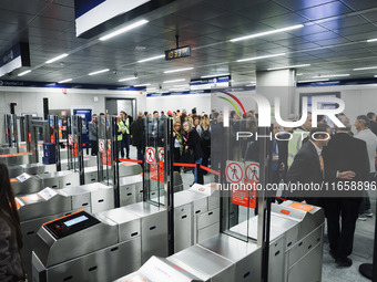 A moment occurs during the inauguration of the entire section of the Metropolitana M4 Blu Line from San Cristoforo to Linate in Milan, Italy...