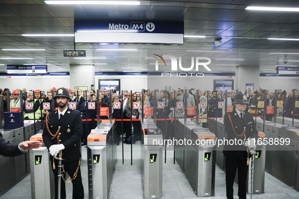 A moment occurs during the inauguration of the entire section of the Metropolitana M4 Blu Line from San Cristoforo to Linate in Milan, Italy...