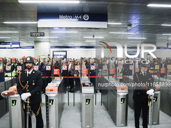 A moment occurs during the inauguration of the entire section of the Metropolitana M4 Blu Line from San Cristoforo to Linate in Milan, Italy...