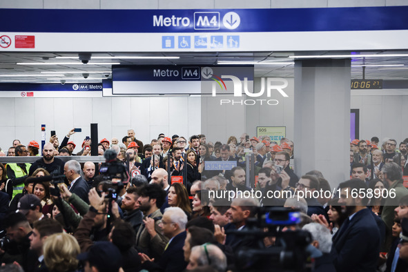 A moment occurs during the inauguration of the entire section of the Metropolitana M4 Blu Line from San Cristoforo to Linate in Milan, Italy...