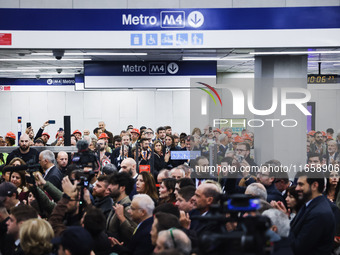 A moment occurs during the inauguration of the entire section of the Metropolitana M4 Blu Line from San Cristoforo to Linate in Milan, Italy...