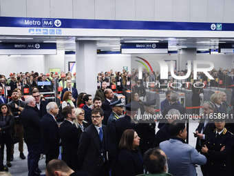 A moment occurs during the inauguration of the entire section of the Metropolitana M4 Blu Line from San Cristoforo to Linate in Milan, Italy...