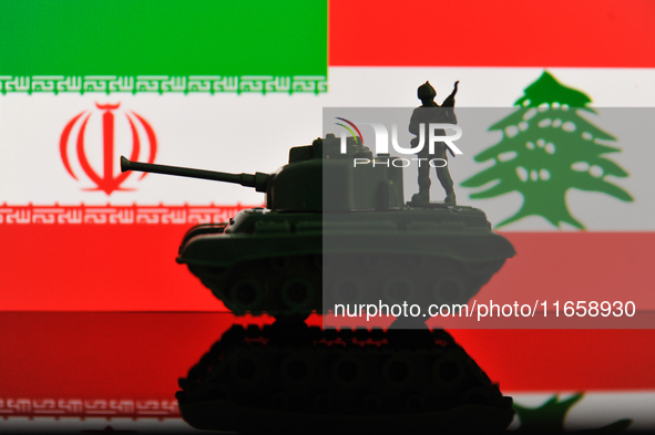 Illustration with figures of a soldier and a tank in front of Iran and Lebanon flags displayed on a computer screen is seen in L'Aquila, Ita...