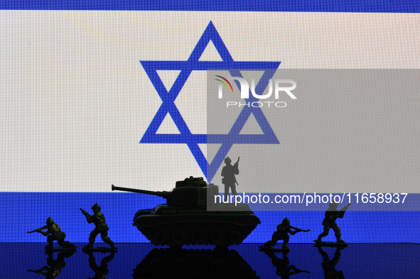 Illustration with figures of soldiers and a tank in front of an Israel flag displayed on a computer screen is seen in L'Aquila, Italy, on Oc...