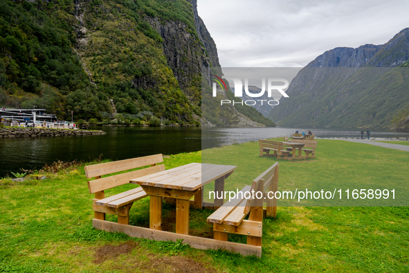 Wooden picnic benches in Gudvangen, Norway, on September 17, 2024. The village of Gudvangen is a popular tourist destination and is located...