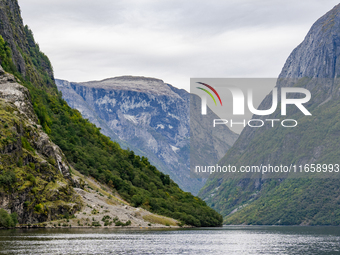 A view of the Nærøyfjord in Gudvangen, Norway, on September 17, 2024. The village of Gudvangen is a popular tourist destination and is locat...