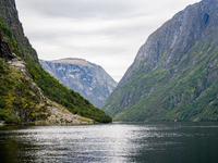 A view of the Nærøyfjord in Gudvangen, Norway, on September 17, 2024. The village of Gudvangen is a popular tourist destination and is locat...