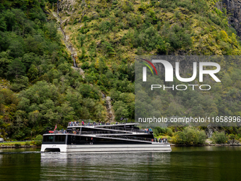 An electric tourist ferry ‘The Fjords’ navigates in the Nærøyfjord, in Gudvangen, Norway, on September 17, 2024. The village of Gudvangen is...