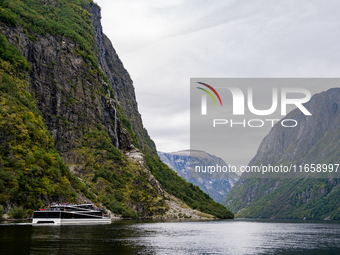 An electric tourist ferry ‘The Fjords’ navigates in the Nærøyfjord, in Gudvangen, Norway, on September 17, 2024. The village of Gudvangen is...