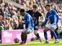 Matt Palmer of Notts County is under pressure from Armando Dobra of Chesterfield and battles with Lewis Gordon of Chesterfield during the Sk...